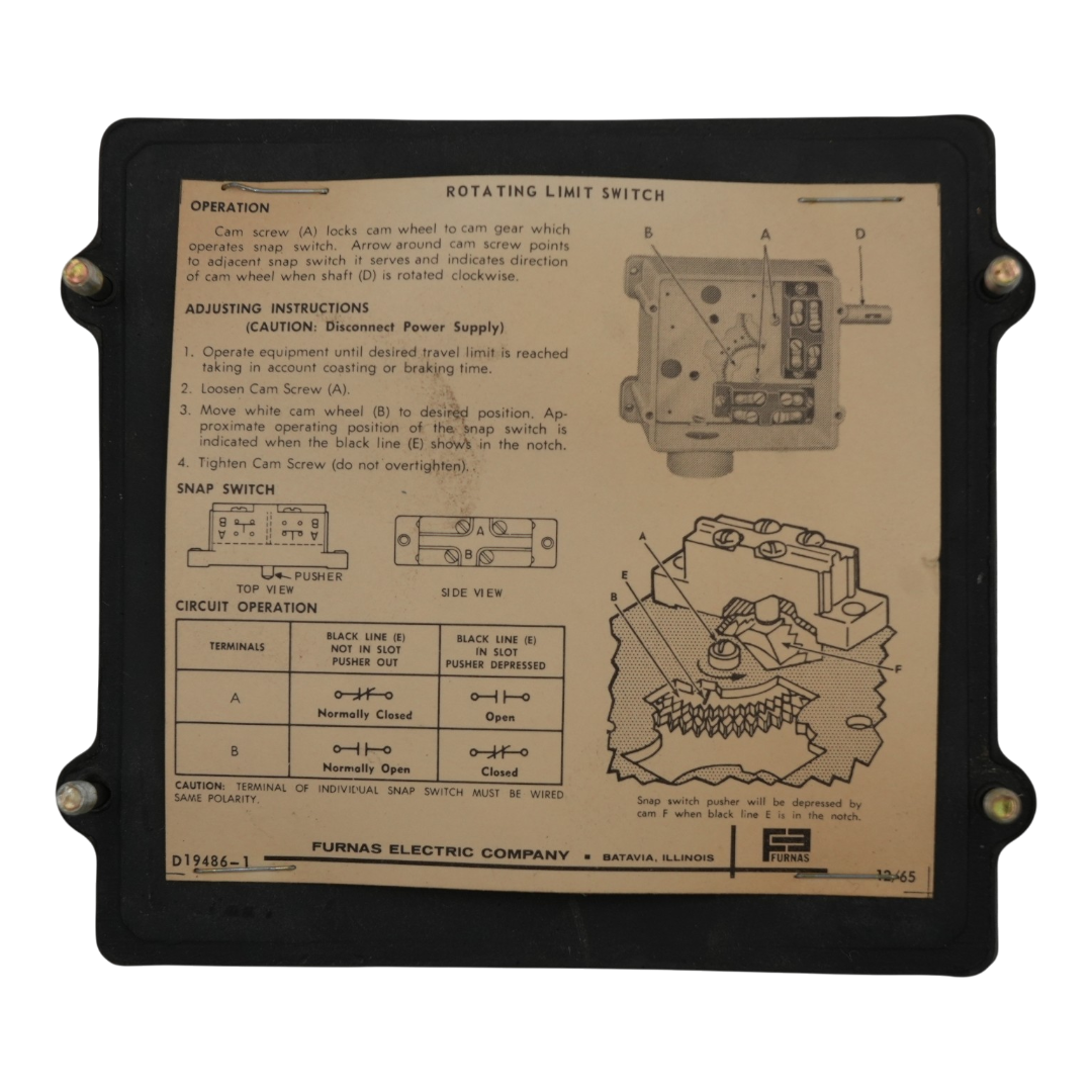 A vintage Furnas Electric Company rotating limit switch control panel with a black metal frame and a tan printed instruction plate showing diagrams, terminal connections, and operational notes.
