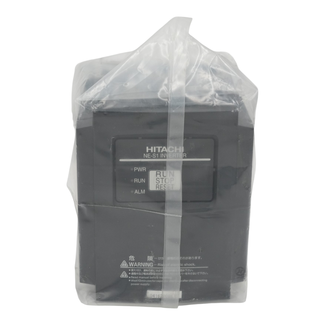 A Hitachi NE-S1 inverter unit in its original clear plastic protective packaging, with a clear strap securing it. The black device features the HITACHI logo and terminal labels for PWR, RUN, STOP, and RESET.