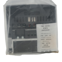 A packaged industrial black Hitachi VFD wrapped in a clear plastic protective sleeve on transparent background.